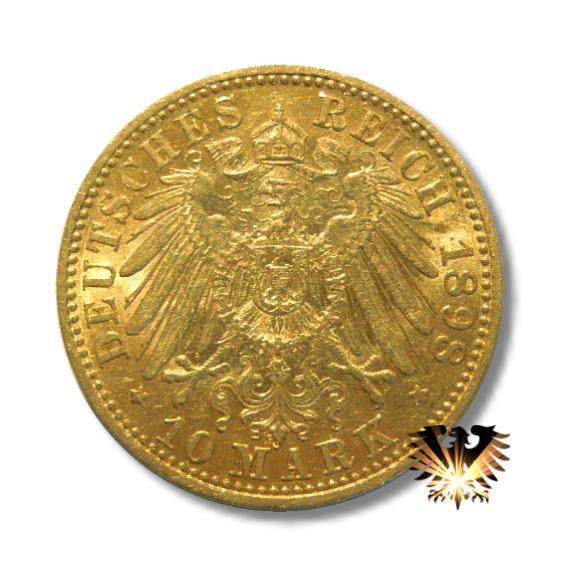 Das Bild zeigt die Seite der Münze mit dem kleinen Adler der 10 Mark Goldmünze, Jahrgang 1888. Geprägt von 1874 bis 1889.